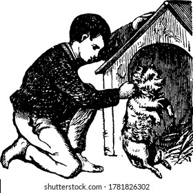 A young boy playing with his dog in front of dog's kennel and the dog is standing on his two feet's, vintage line drawing or engraving illustration.