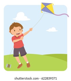 young boy with red shirt flying a kite in the field