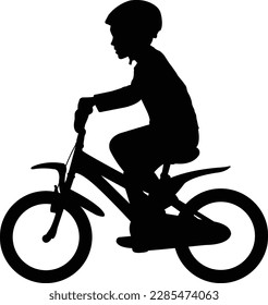 young boy riding bicycle silhouette - vector
