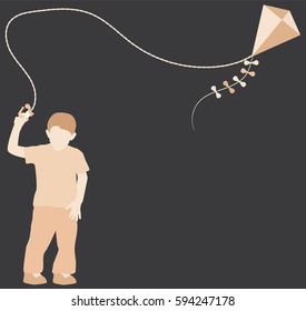 Young boy simple silhouette standing holding a kite flying it in the air on a grey background