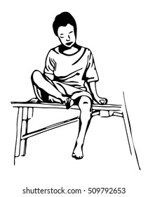 a young boy sits on a bench.
