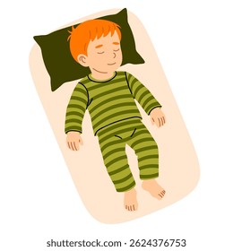 Young boy sleeping flat on his back in striped green pajamas with head on pillow