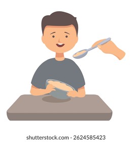 Young boy smiles while eating porridge from a bowl at a table, being fed by his kindergarten teacher