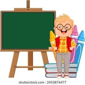 Young boy smiling beside chalkboard and books.