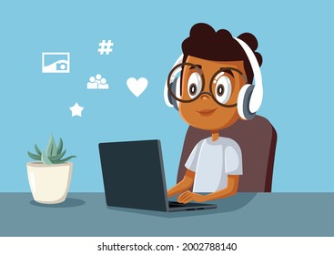 Young Boy Spending Time on Social Media on His Laptop. Smiling child procrastinating homework while listening to music
