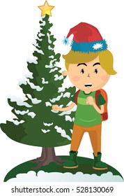 Young boy standing beside a decorated christmas tree wearing santa hat
