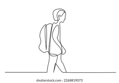 young boy student walking to school with backpack