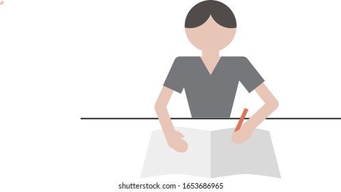 A young boy studying on the desk