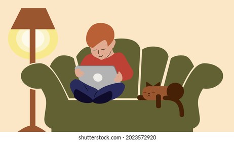 Young boy using laptop at home. Home schooling or online education during pandemic concept