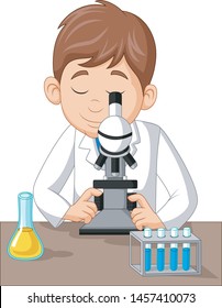 Young boy using microscope on the laboratory