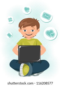 Young boy working on a laptop.