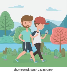 young boys walking using smartphones in the park