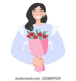 Young brunette woman with a bouquet of flowers. Valentine's day or International Women's Day concept.