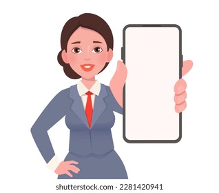 Young brunette woman with smartphone in hand show empty display.  Girl in a business suit with smartphone in hand show empty display.