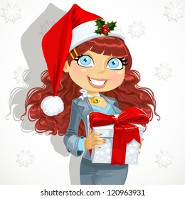 Young business lady in Santa cap gives a gift