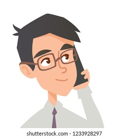 The young business man in glasses talking on phone. Male office clerk communicates on smart-phone.
