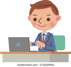 Young business man in a suit using a laptop at a desk (bust up)