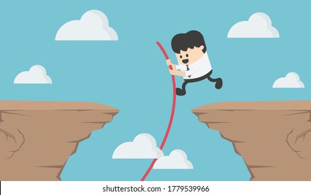 Young business man who jumps over a steep cliff