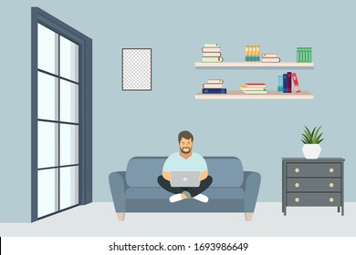 Young business man working with laptop on sofa