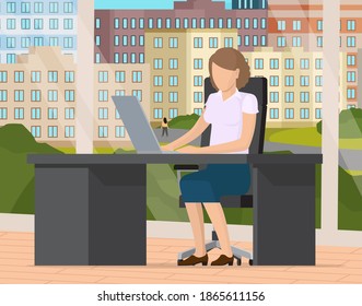 Young business woman at the desk is working on the laptop computer with the big panoramic window with cityscape behind. Secretary in office workspace, businesswoman person, trainee typing on keyboard