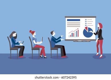 Young business woman giving a class or lecture. Un the audience, seated, there are men and business women. Business Conference concept.