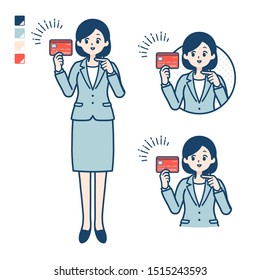 A young Business woman in a suit with pointing at credit card images. 