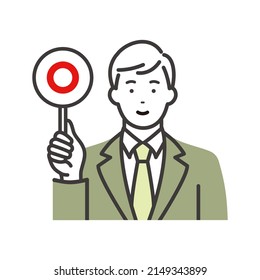 A young businessman with an answer tag. Correct answer tag.
