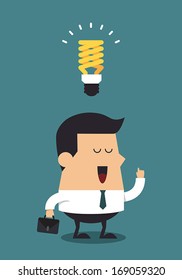 Young businessman with energy saving fluorescent light bulb, Business concept