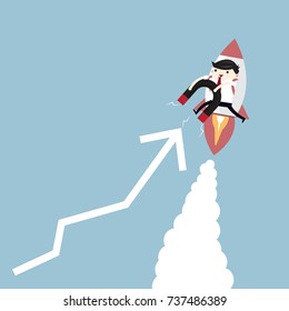 Young Businessman flies with rocket, holds large magnet and attracts business graph ,success concept.