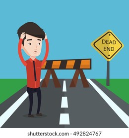 Young businessman having trouble in business. Desperate businessman clutching his head while standing in front of road barrier and road sign dead end. Vector flat design illustration. Square layout.