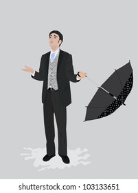 Young businessman holding umbrella in rain looking up at drops