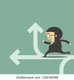 young businessman looking at arrows 