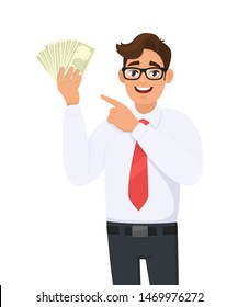 Young businessman showing cash, money and pointing index finger. Person holding currency notes. Male character design illustration. Human emotions and expressions concept in vector cartoon style.