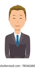 A young businessman is smiling
