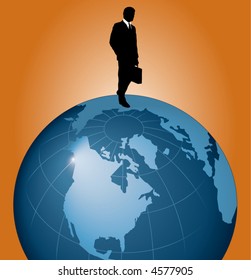A young businessman stands on top of the world