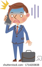 Young businessman in a suit talking on a smartphone (shocked expression)