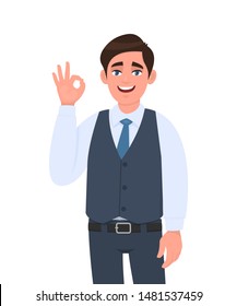 Young businessman in waistcoat showing okay or OK gesture. Person making symbol of agree, good or cool sign. Male character design illustration. Human emotions, expressions concept in vector cartoon.