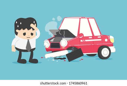 young businessman who has suffered a car accident causes severe damage to his car, showing an expression of hopelessness.