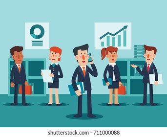 Young businessmen and business women talking and discussing in office
