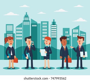 Young businessmen and business women talking and discussing in the city street