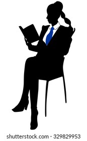 young businesswoman sitting on chair and reading