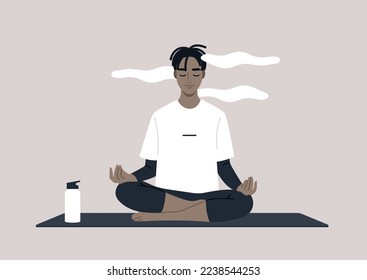 Young calm male African character meditating in a lotus yoga pose, a mindful lifestyle concept