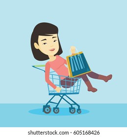 Young carefree customer having fun while riding by shopping trolley. Cheerful asian woman with a lot of shopping bags sitting in shopping trolley. Vector flat design illustration. Square layout.