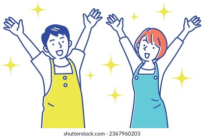 A young caregiver wearing an apron and cheering