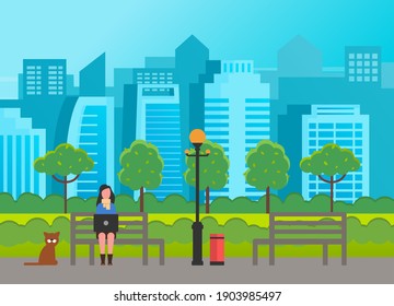 Young cartoon brunette girl wearing scarf sits on bench in a park with laptop on her lap. City park, street lamp, cat, cityscape, skyscrapers, buildings. Walking in the park. Flat vector image.
