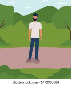 young and casual man with beard in the field