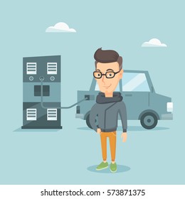 Young caucasian man charging electric car at charging station. Man standing near power supply for electric car. Charging of electric car. Vector flat design illustration. Square layout.