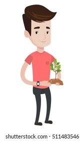 Young caucasian man holding in hands green small plant in soil. Friendly man with plant in hands. Man taking care of small green plant. Vector flat design illustration isolated on white background.