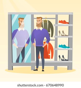 Young caucasian man looking in the mirror in the dressing room. Man trying on sweater in the dressing room. Man choosing clothes in the dressing room. Vector flat design illustration. Square layout.