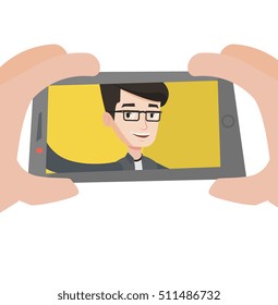Young caucasian man making selfie. Man taking photo with cellphone. Young guy taking selfie. Man taking selfie using his smartphone. Vector flat design illustration isolated on white background.